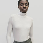 White slim fit roll neck jersey top in lightweight Tencel cotton by Mijeong Park