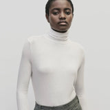 White slim fit roll neck jersey top in lightweight Tencel cotton by Mijeong Park