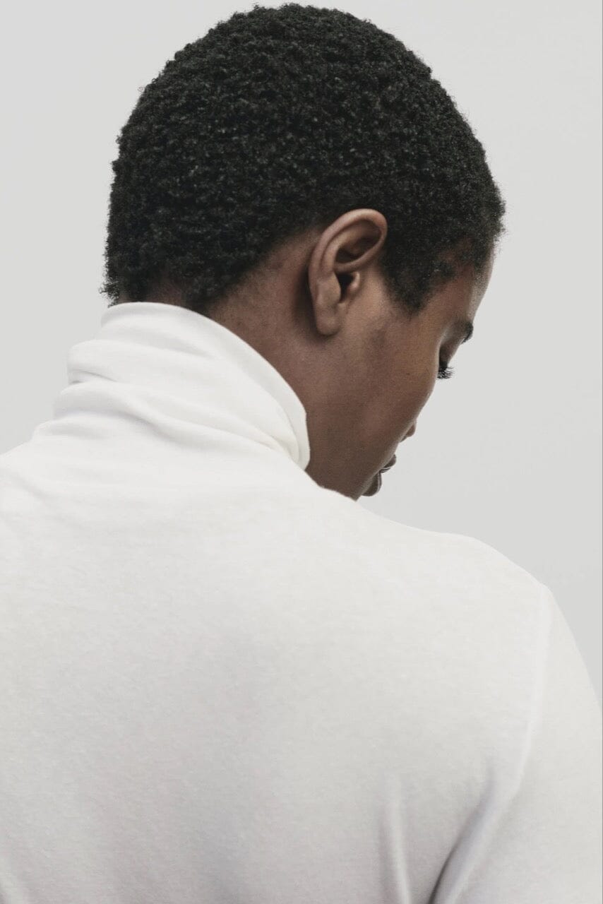 White slim fit roll neck jersey top in lightweight Tencel cotton by Mijeong Park