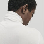 White slim fit roll neck jersey top in lightweight Tencel cotton by Mijeong Park
