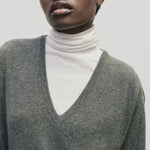 White slim fit roll neck jersey top in lightweight Tencel cotton by Mijeong Park