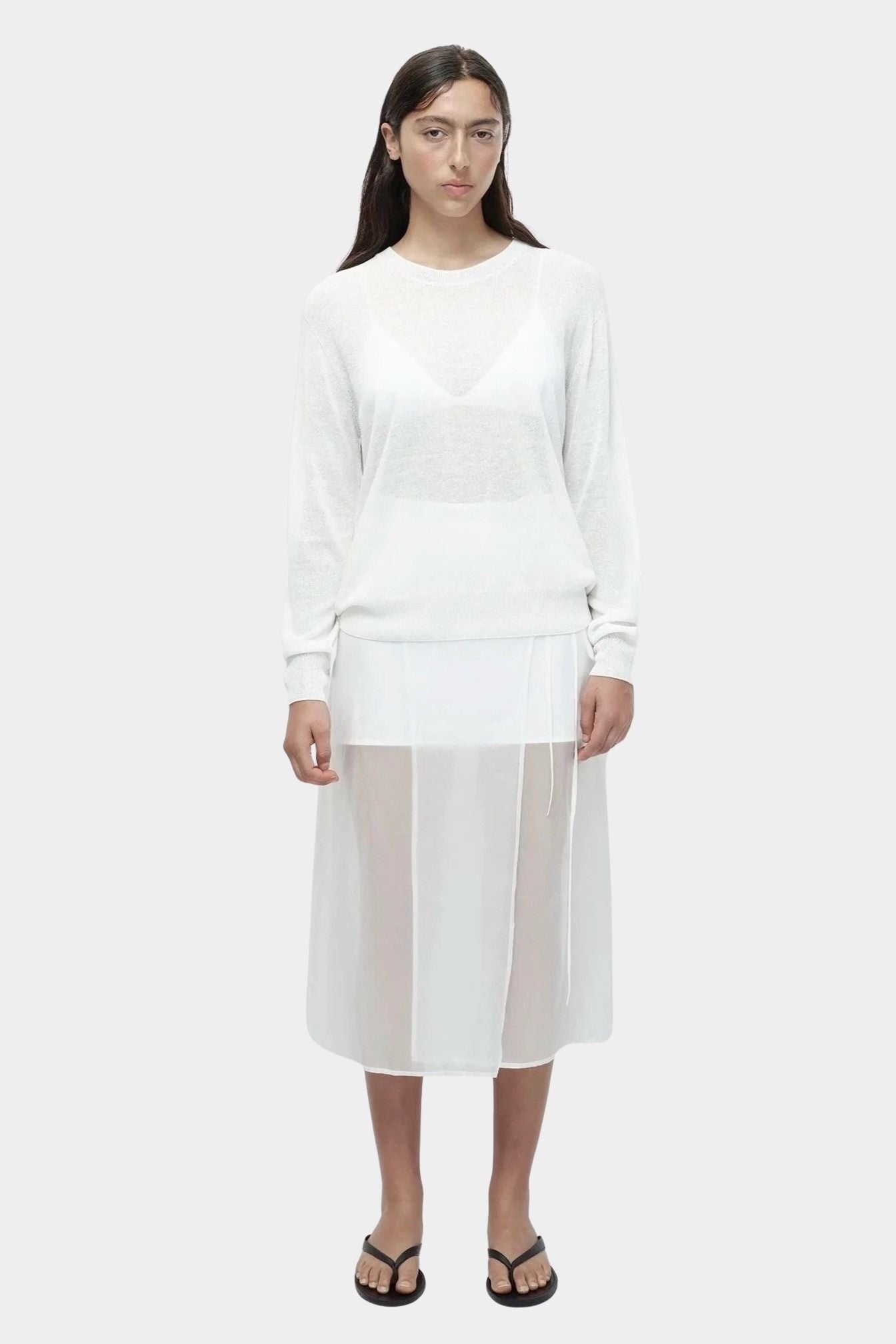 Front view of semi sheer linen blend knit top in white by Mijeong Park lightweight long sleeve crewneck sweater