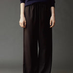 Close front view of the Mijeong Park Wool Blend Drawstring Pants showing the elastic waist and tie