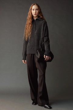 Mijeong Park Wool Blend Drawstring Pants in black styled with a charcoal sweater and leather bag
