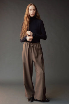 Front view of the Mijeong Park Wool Blend Drawstring Pants at SHOP YUCCA in Denver