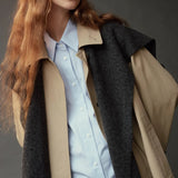 Mijeong Park Wool Blend Knit Shawl Charcoal worn over beige trench coat, close-up view