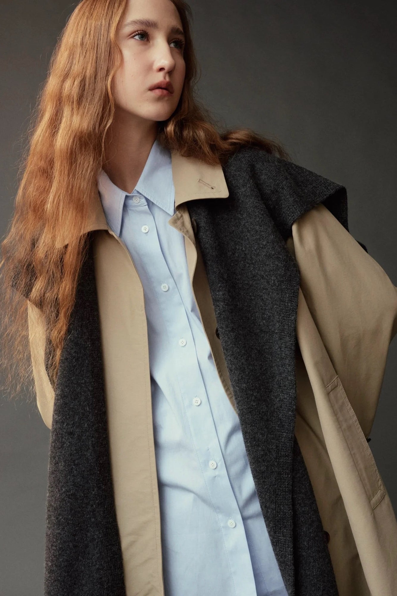 Mijeong Park Wool Blend Knit Shawl Charcoal worn over beige trench coat, close-up view