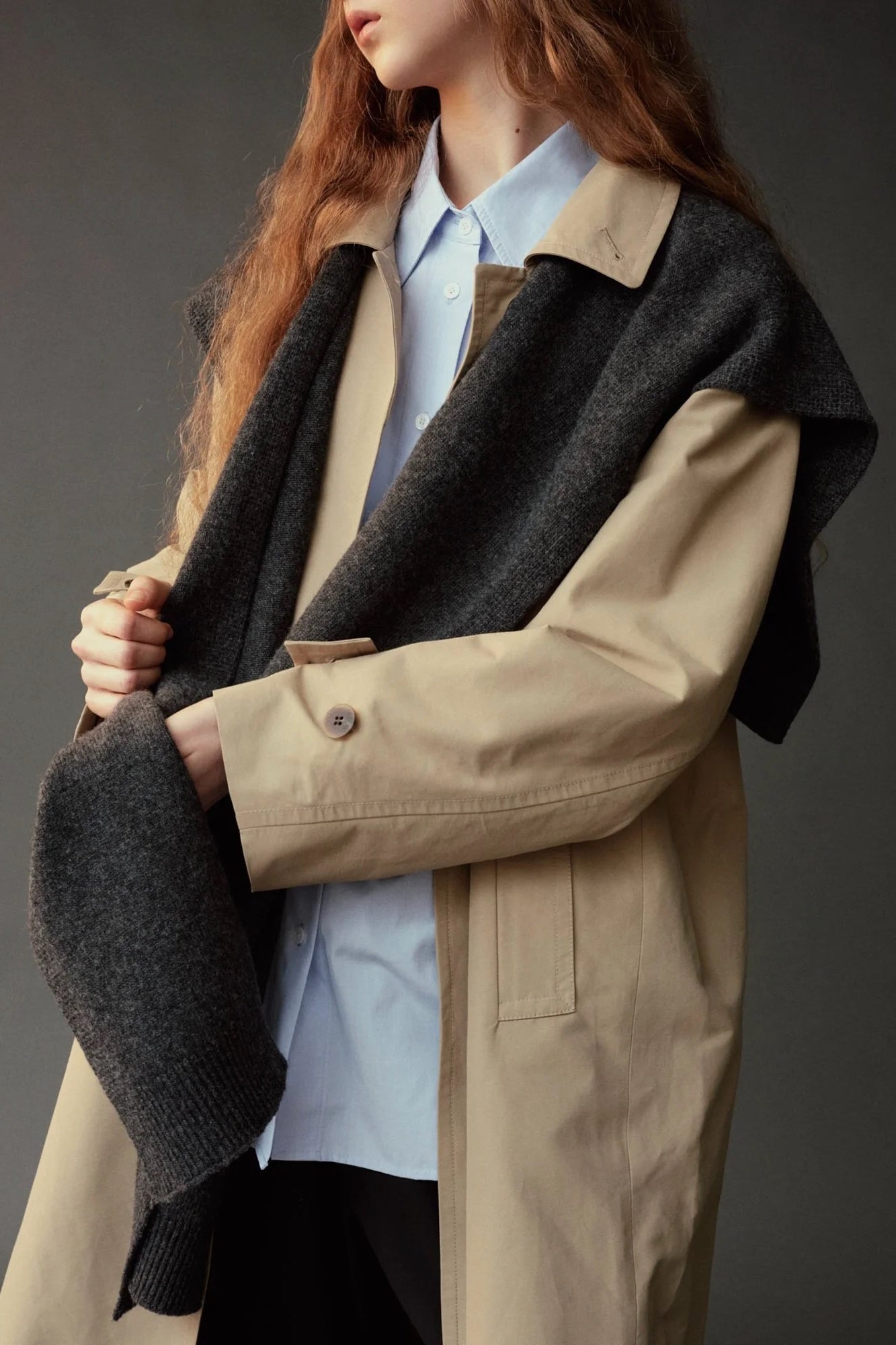 Mijeong Park Wool Blend Knit Shawl Charcoal styled over beige trench coat, detail view