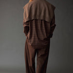 Mijeong Park Wool Blend Knit Shawl Light Brown layered over plaid shirt, back view