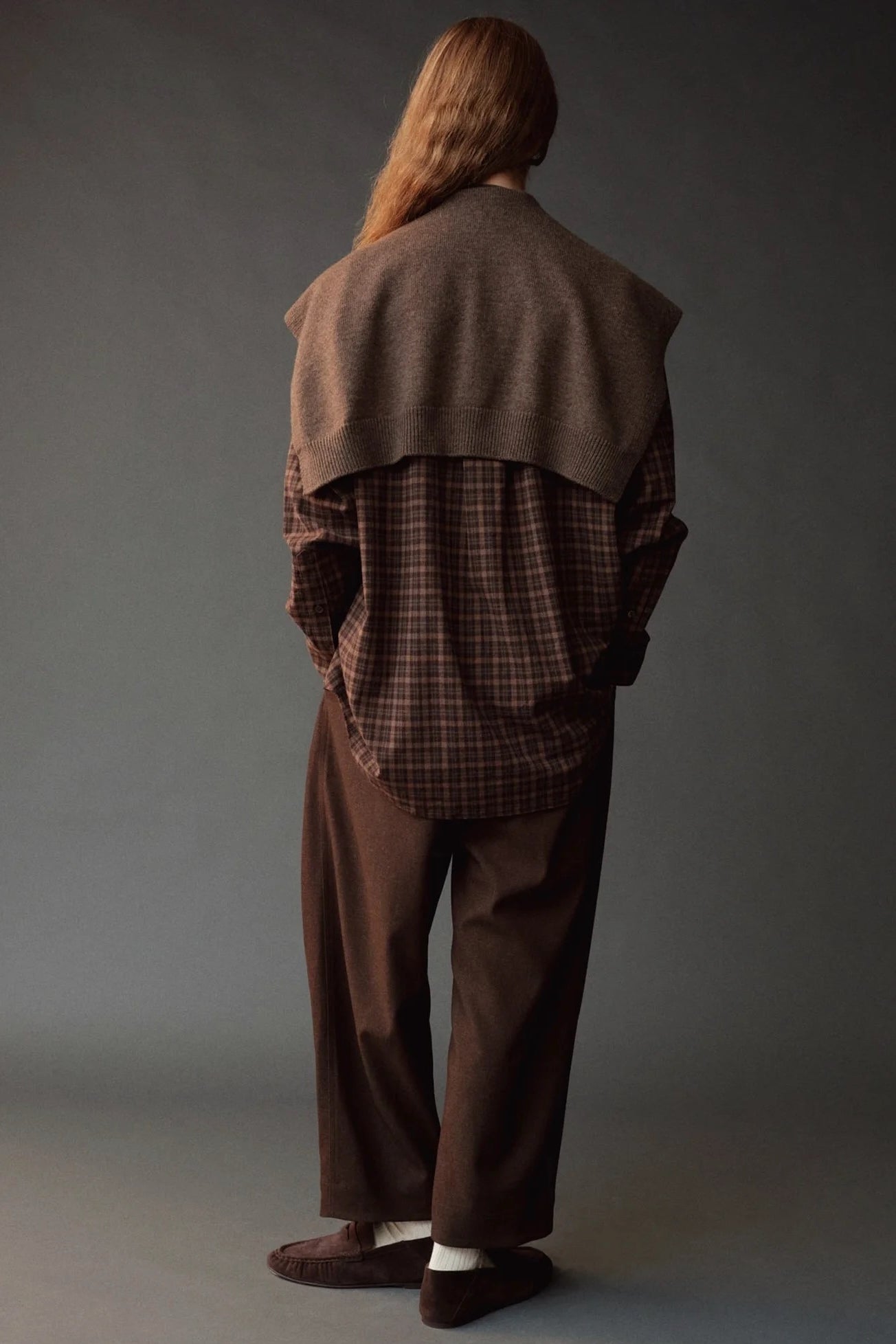 Mijeong Park Wool Blend Knit Shawl Light Brown layered over plaid shirt, back view