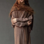 Mijeong Park Wool Blend Knit Shawl Light Brown styled over matching knit sweater and trousers