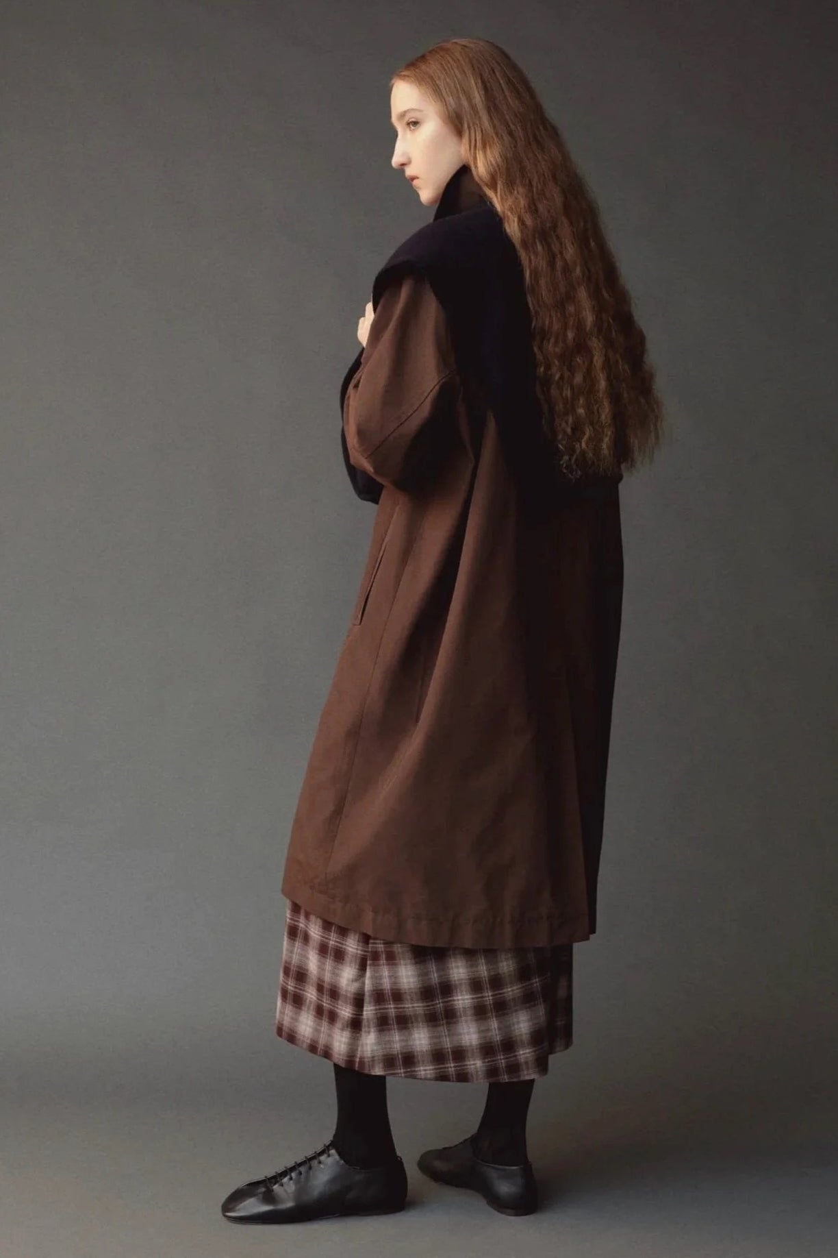 Mijeong Park Wool Blend Knit Shawl Navy draped across shoulders over brown coat, back view
