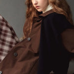 Mijeong Park Wool Blend Knit Shawl Navy draped over brown coat, editorial styling