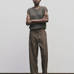 Light brown wool blend workwear trousers by Mijeong Park