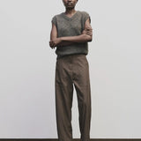 Light brown wool blend workwear trousers by Mijeong Park