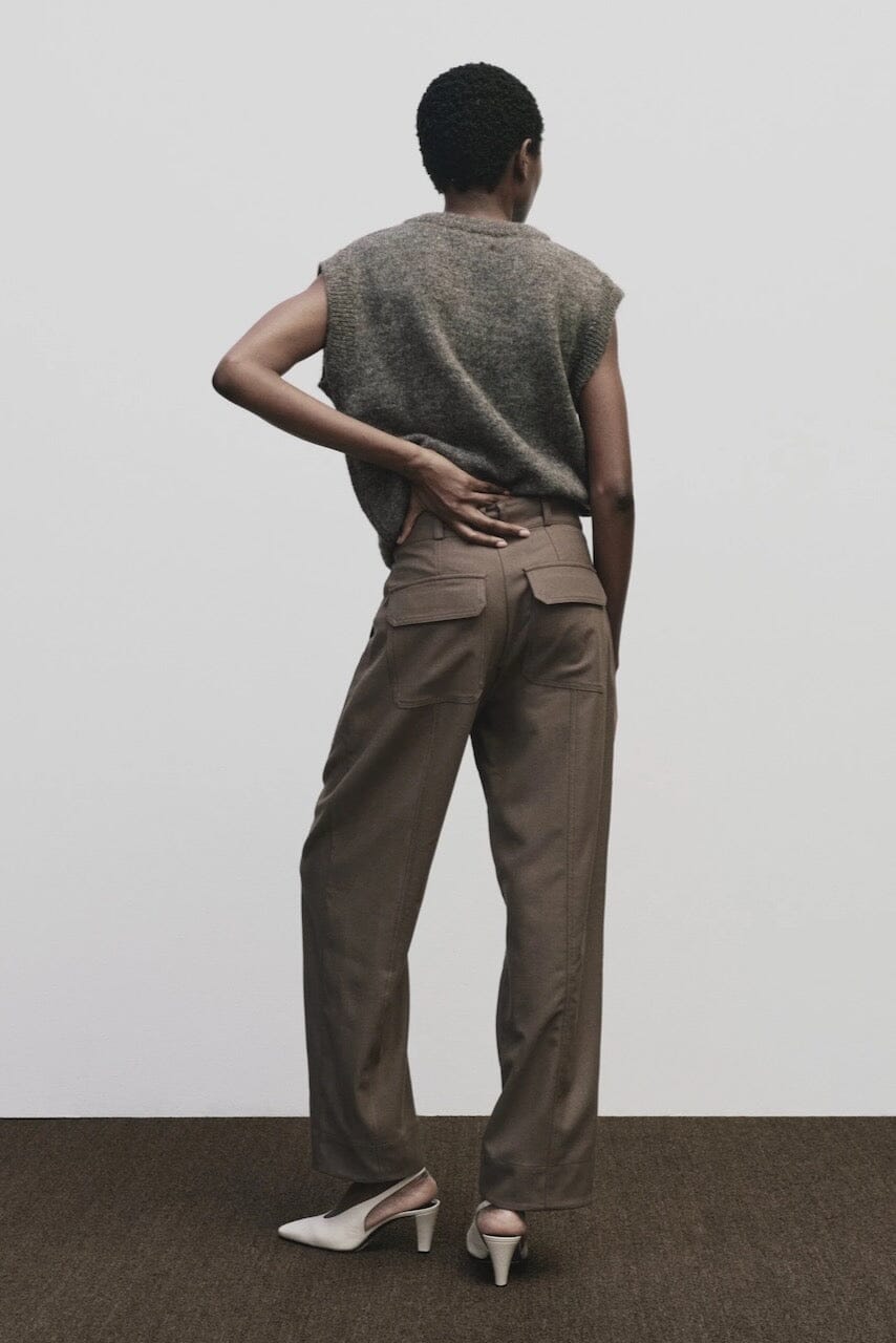 Light brown wool blend workwear trousers by Mijeong Park