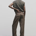 Light brown wool blend workwear trousers by Mijeong Park