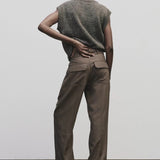 Light brown wool blend workwear trousers by Mijeong Park