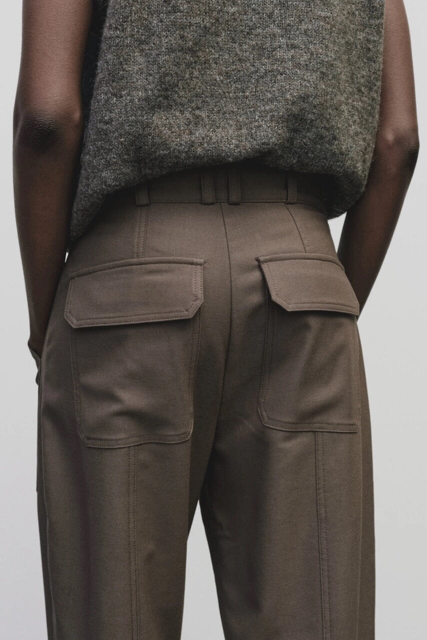 Light brown wool blend workwear trousers by Mijeong Park