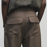 Light brown wool blend workwear trousers by Mijeong Park