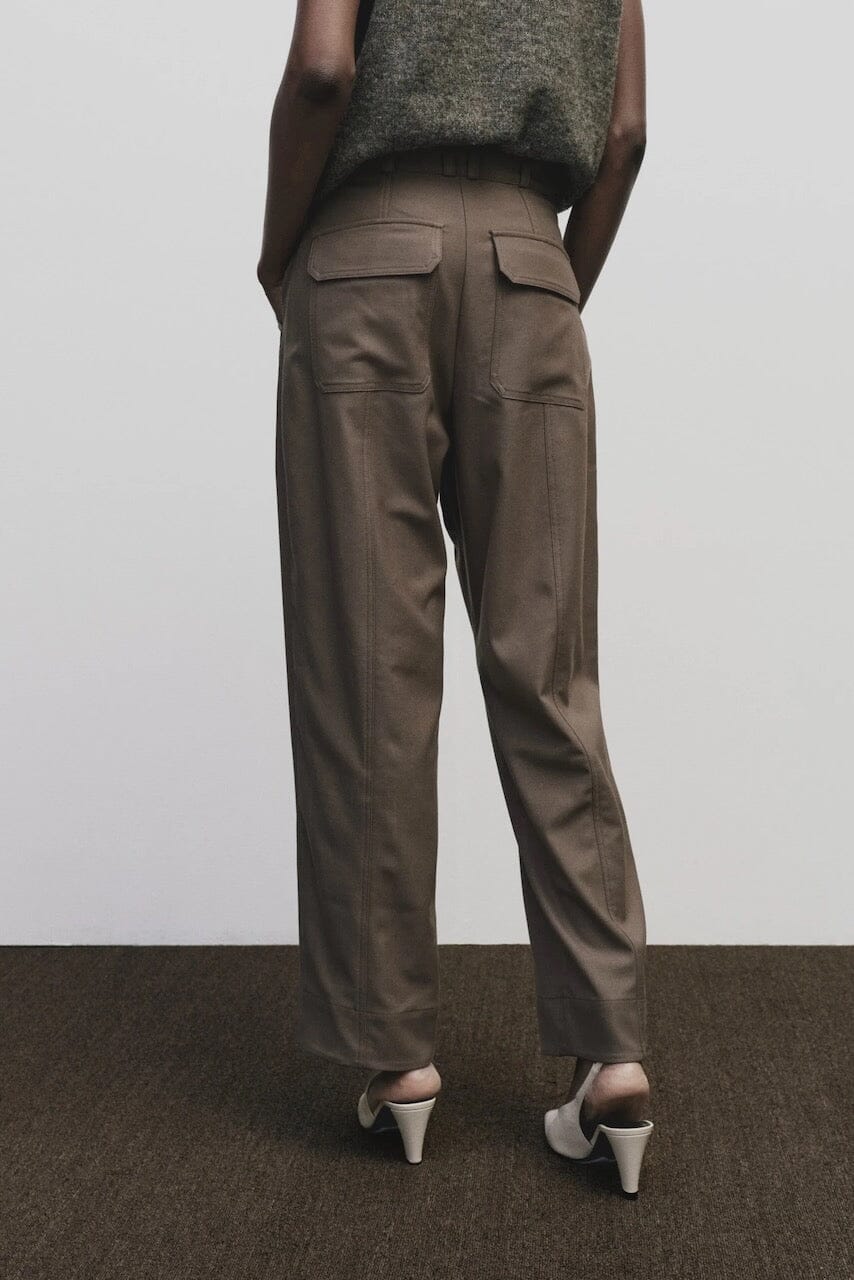 Light brown wool blend workwear trousers by Mijeong Park