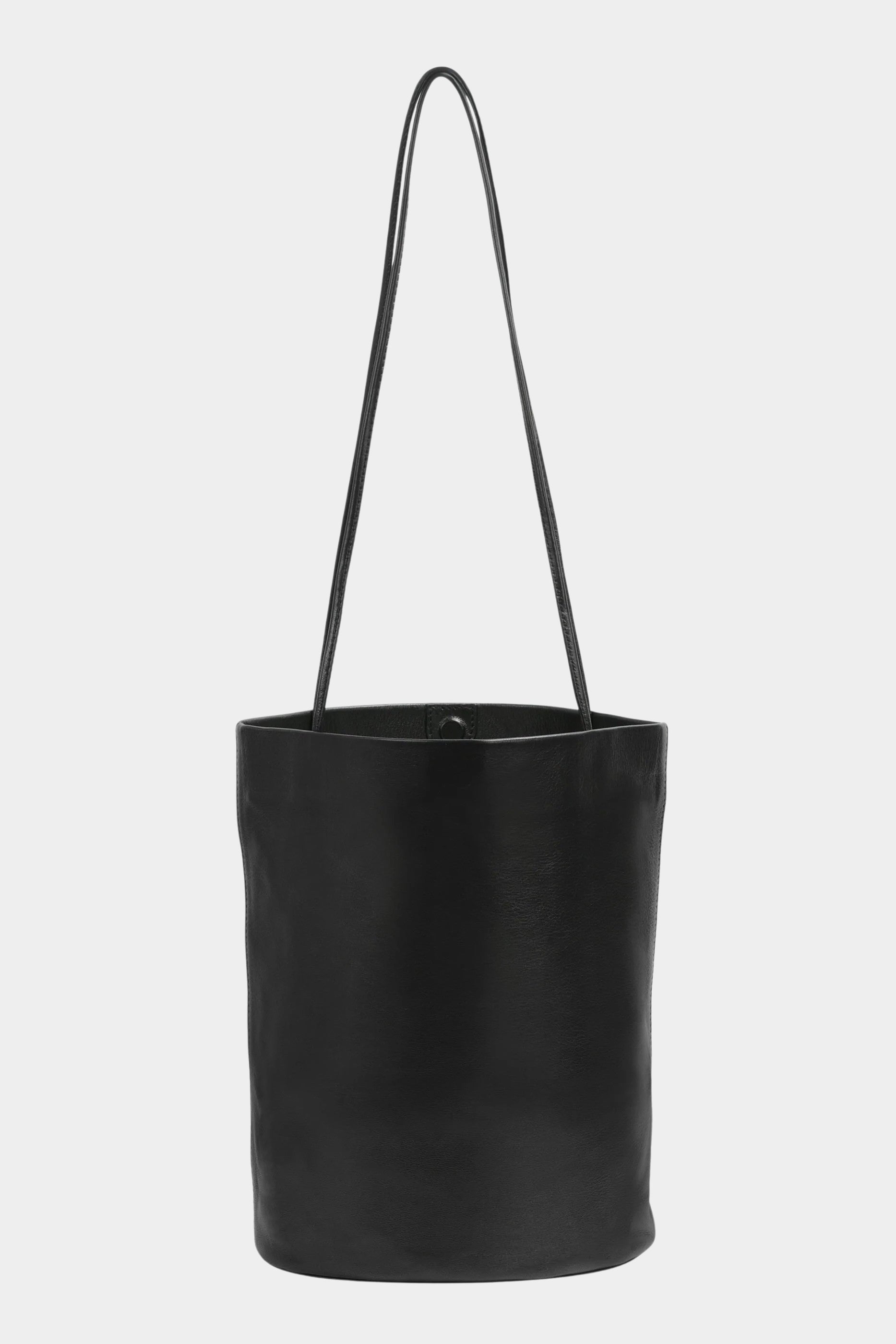 Front view of the Modern Weaving Drape Oval Bucket in black with long shoulder straps