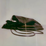 Modern Weaving Slim Lamb Sak Black side view showing slim profile and soft drape