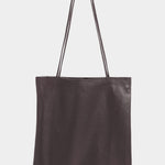 Front view of the Braun leather Slim Lamb Sak with slender shoulder straps, available at YUCCA Denver