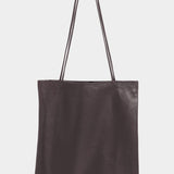 Front view of the Braun leather Slim Lamb Sak with slender shoulder straps, available at YUCCA Denver