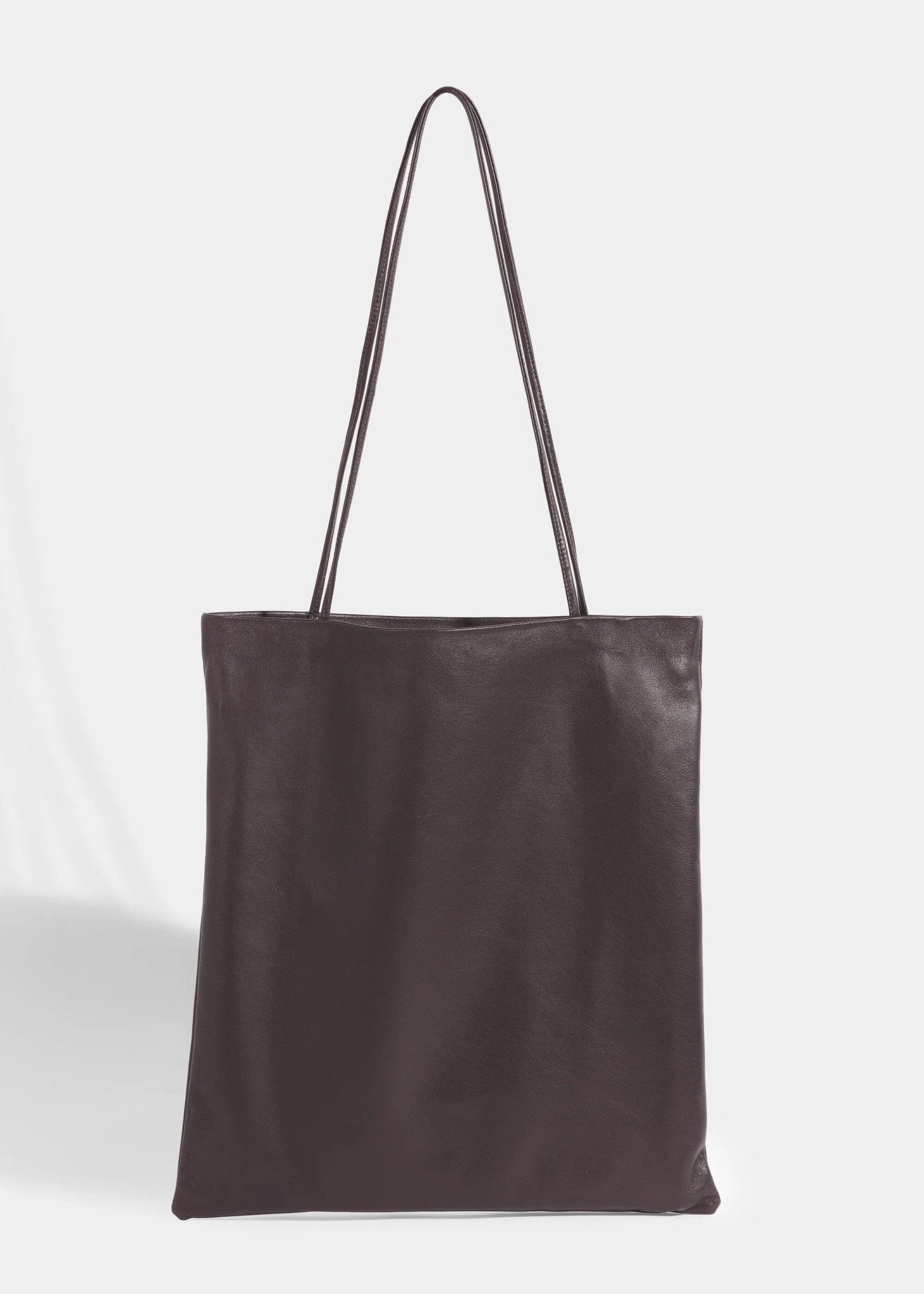 Modern Weaving | Slim Lamb Sak In Braun - SHOP YUCCA Handbags MODERN WEAVING - YUCCA, Women’s clothing store Denver, women’s high quality bags, women’s online leather bags, minimalist leather bags.