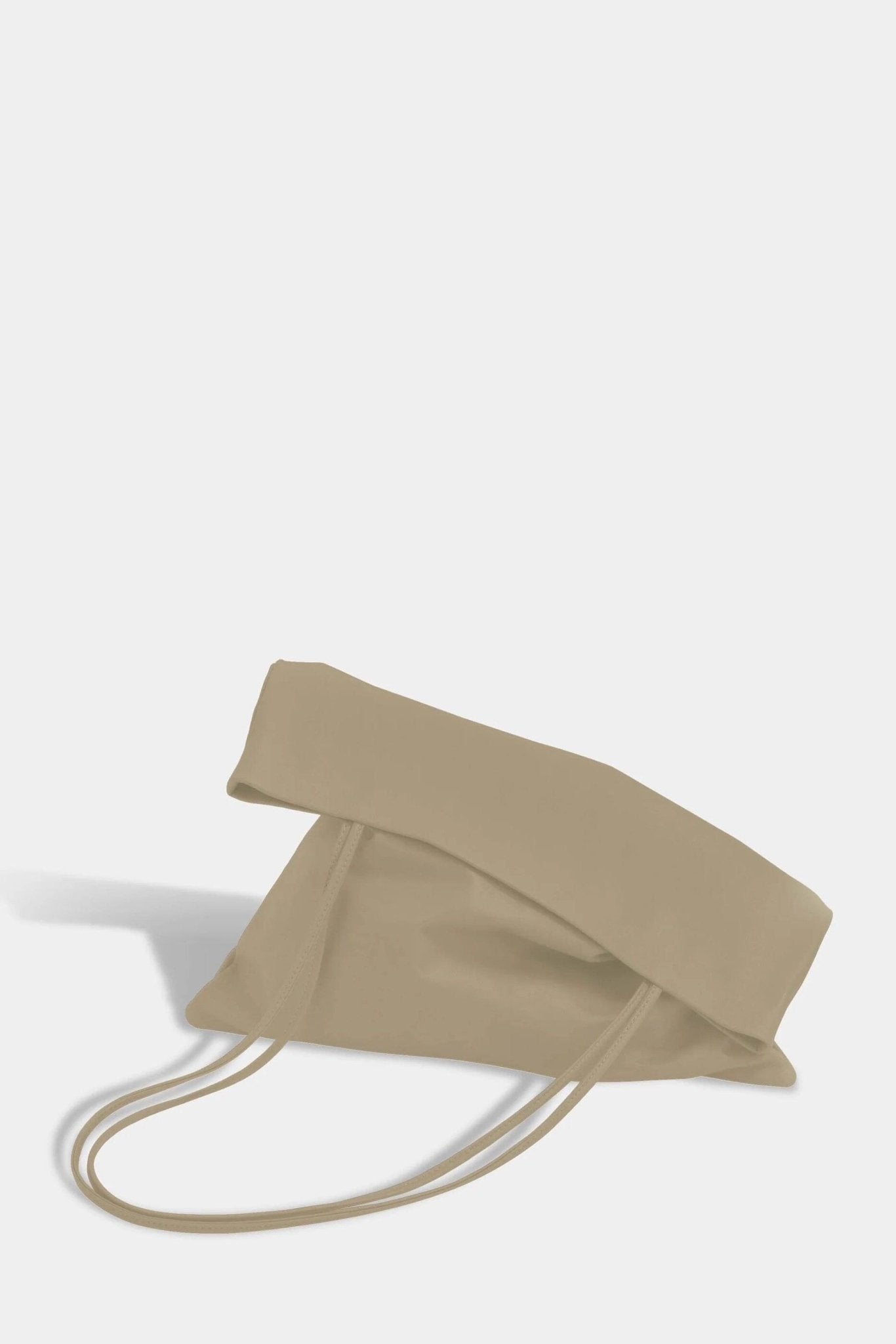 Modern Weaving | Slim Lamb Sak In Taupe - SHOP YUCCA Handbags MODERN WEAVING - YUCCA, Women’s clothing store Denver, women’s high quality bags, women’s online leather bags, minimalist leather bags.