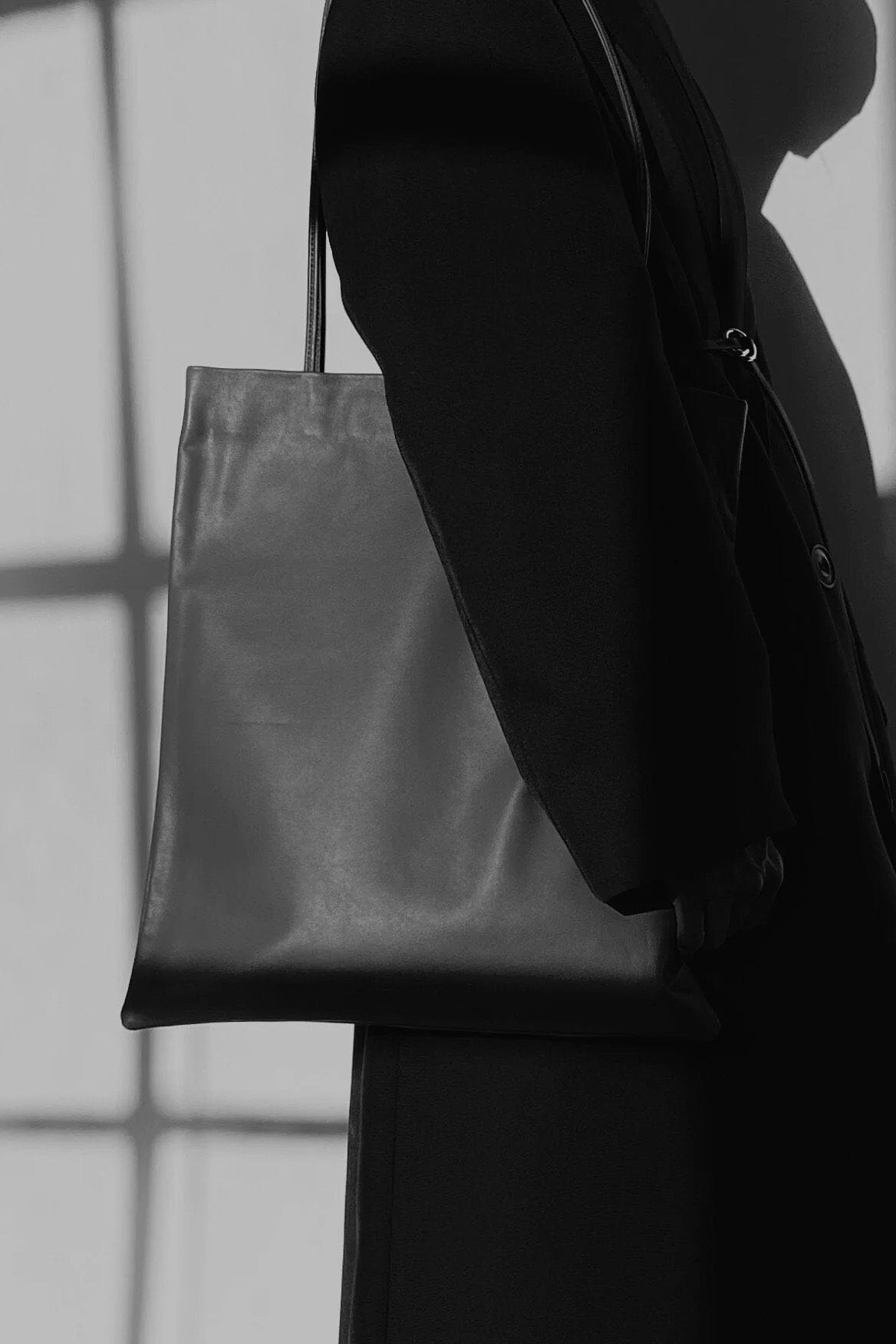 Modern Weaving | Slim Lamb Sak In Taupe - SHOP YUCCA Handbags MODERN WEAVING - YUCCA, Women’s clothing store Denver, women’s high quality bags, women’s online leather bags, minimalist leather bags.