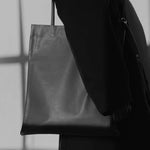 Modern Weaving | Slim Lamb Sak In Taupe - SHOP YUCCA Handbags MODERN WEAVING - YUCCA, Women’s clothing store Denver, women’s high quality bags, women’s online leather bags, minimalist leather bags.