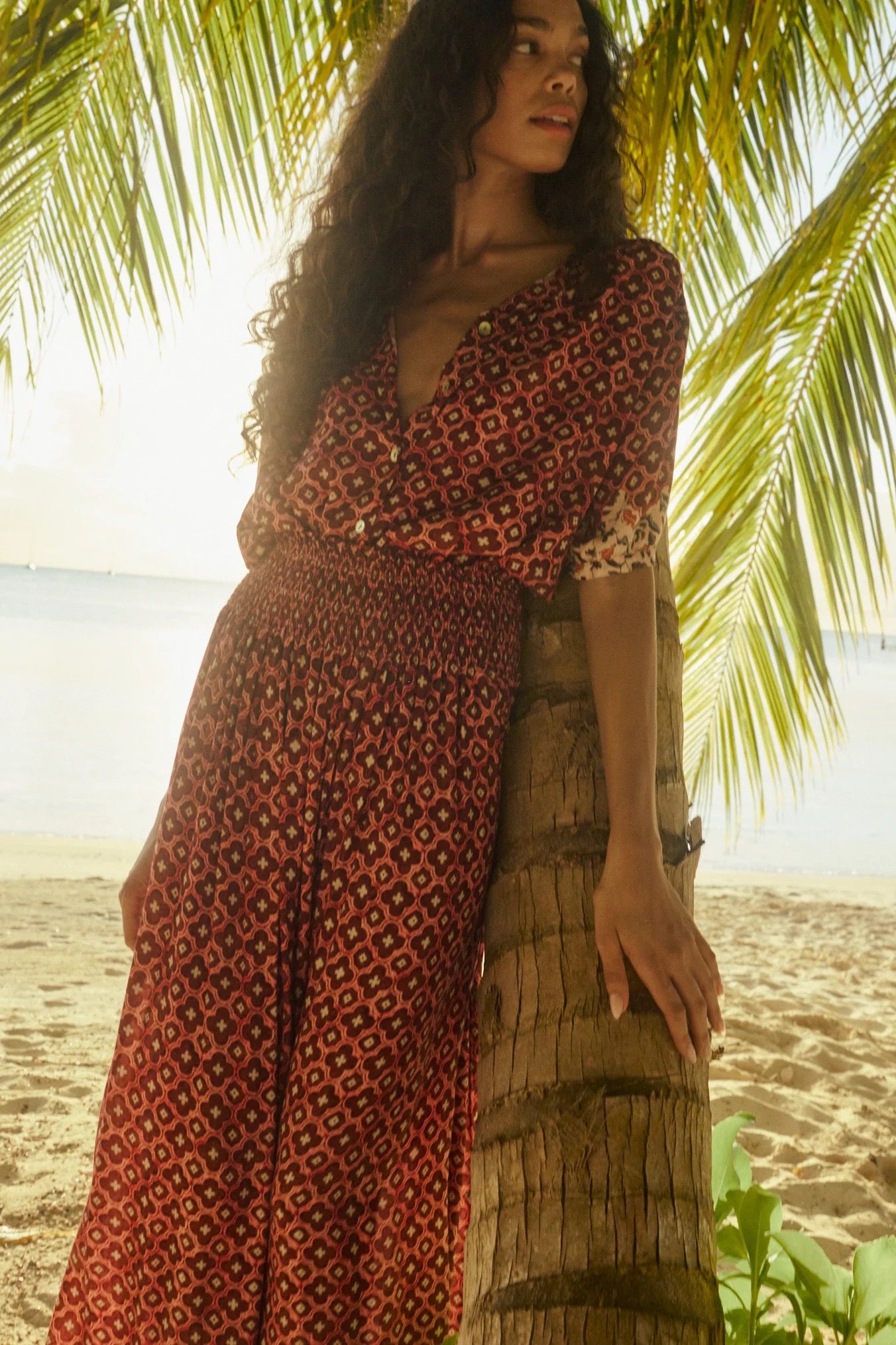 Natalie Martin Bella Skirt Mosaic Spice relaxed printed maxi skirt under palm trees