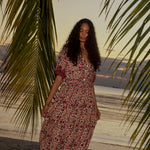 Natalie Martin Bella Skirt Wildflower Spice tropical sunset campaign image with flowing floral skirt and gathered waist
