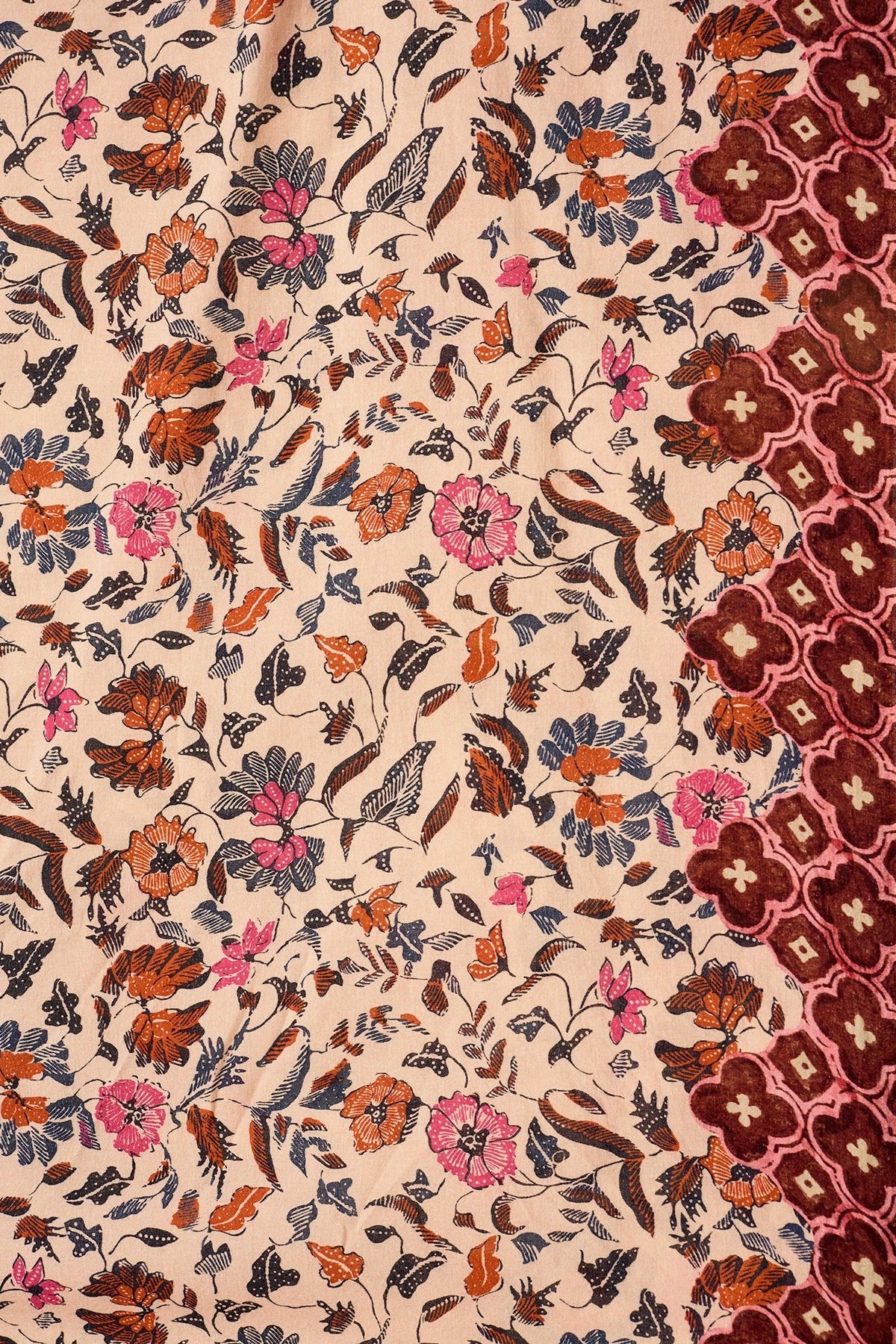 Natalie Martin Bella Skirt Wildflower Spice floral print detail with contrasting border trim and hand-drawn motif