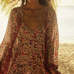 Natalie Martin Fiore Maxi Wildflower Spice floral dress close-up with deep neckline and lightweight rayon texture