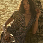 Natalie Martin Monica Dress Delphi Ink deep v-neck printed maxi dress on beach