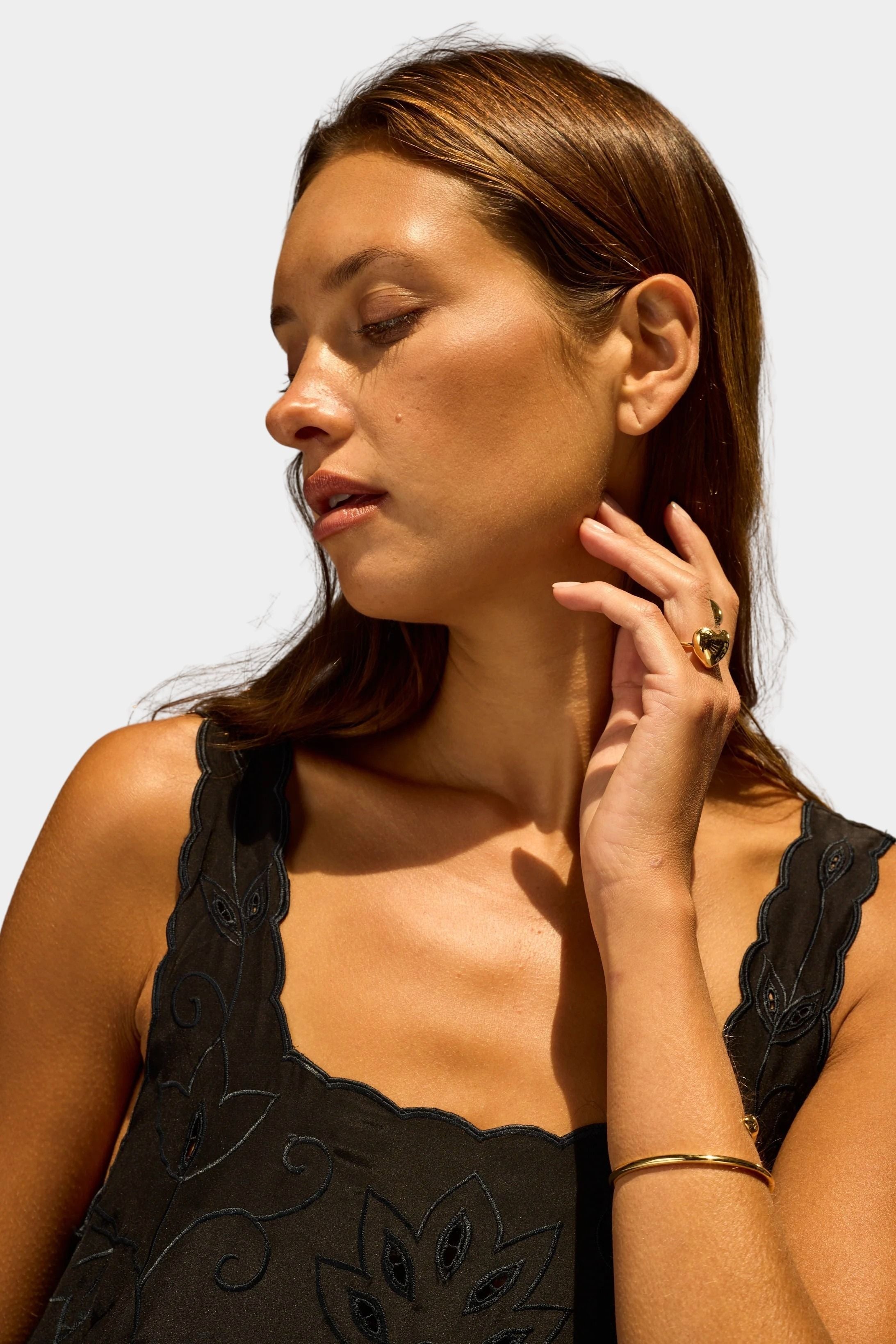 Natalie Martin Nadia Dress Black Silk Embroidery close-up portrait with tonal floral embroidery and soft silk drape
