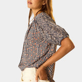 Natalie Martin Violet Top Delphi Ink side angle with airy viscose drape and relaxed sleeve shape