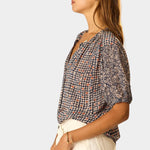 Natalie Martin Violet Top Delphi Ink side profile view with relaxed bohemian silhouette and mixed print details