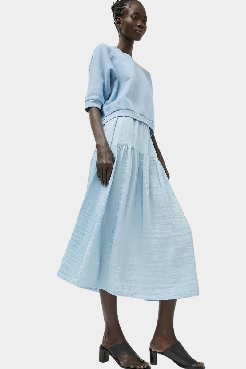 Full length look featuring No.6 Emily Sweatshirt Chambray and airy blue midi skirt at SHOP YUCCA Denver
