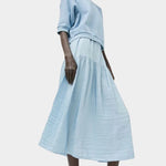 Full length look featuring No.6 Emily Sweatshirt Chambray and airy blue midi skirt at SHOP YUCCA Denver