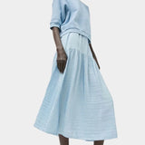 Full length look featuring No.6 Emily Sweatshirt Chambray and airy blue midi skirt at SHOP YUCCA Denver