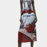 Full length view of No.6 Hiroko skirt in Cinema print paired with matching pleated top, featuring fluid movement and scenic abstract print