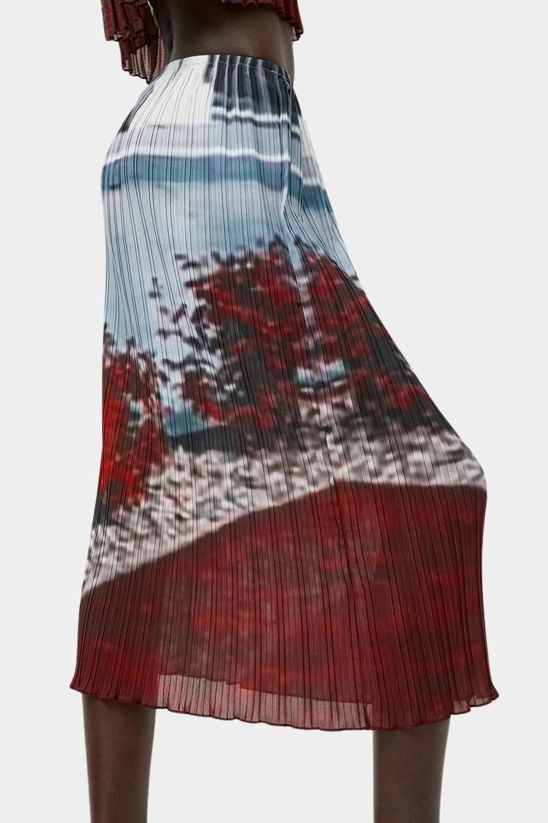 No.6 Hiroko pleated midi skirt in Cinema print with abstract landscape photo motif, elastic waistband, and fluid slim silhouette