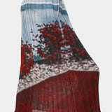 No.6 Hiroko pleated midi skirt in Cinema print with abstract landscape photo motif, elastic waistband, and fluid slim silhouette