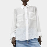 Front view of the No.6 Lake Shirt in White Organza with semi sheer organza texture, patch pockets, relaxed fit, and crisp pointed collar.