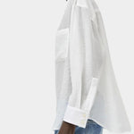 Side profile of the No.6 Lake Shirt in White Organza featuring sheer lightweight fabric, oversized drape, patch pocket detail, and extended cuffs.
