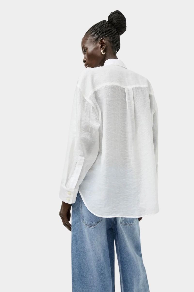 Back view of the No.6 Lake Shirt in White Organza with relaxed oversized silhouette, semi sheer organza texture, curved hem, and fluid drape.